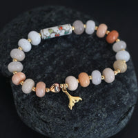 Coastal Heart Stretch Bracelet – Peach Aventurine, Porcelain & Whale Tail Charm - Chocolate and Steel