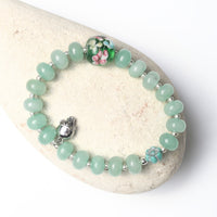Moonlight Bloom Stretch Bracelet – Blue Aventurine, Vintage Glass & Silver Skull - Chocolate and Steel