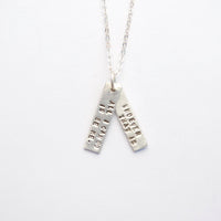 "All I can do is be me, Whoever that is." -Bob Dylan Quote Necklace - Chocolate and Steel