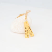 "All I can do is be me, Whoever that is." -Bob Dylan Quote Necklace - Chocolate and Steel