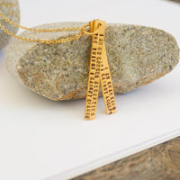 "I am no longer accepting the things I cannot change. I am changing the things I cannot accept." -Angela Davis Quote Necklace - Chocolate and Steel