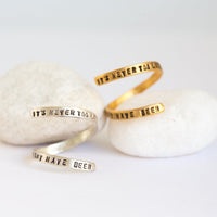 "It's never too late to be what you might have been" -George Eliot wrap ring - Chocolate and Steel