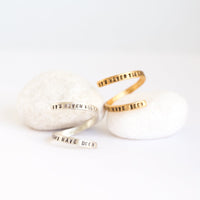 "It's never too late to be what you might have been" -George Eliot wrap ring - Chocolate and Steel