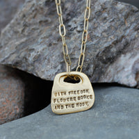 Oscar Wilde Rune Quote Necklace "With freedom, flowers, books, and the moon, who could not be perfectly happy?" - Chocolate and Steel