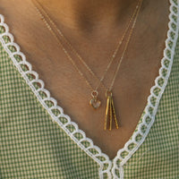 "Somewhere, something incredible waiting to be known" -Carl Sagan quote necklace - Chocolate and Steel