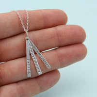 "Somewhere, something incredible waiting to be known" -Carl Sagan quote necklace - Chocolate and Steel