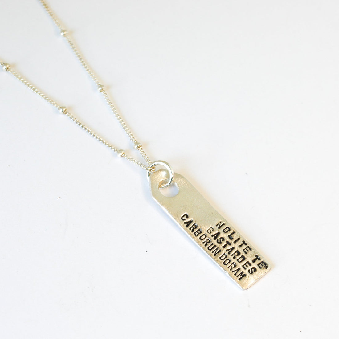 "Bastardes" Luggage Tag Quote Necklace - Chocolate and Steel