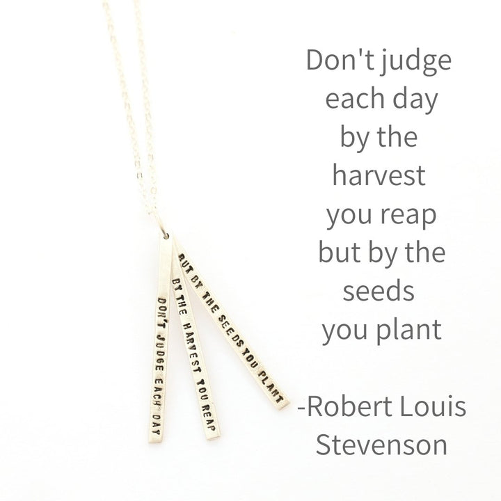"Don't judge each day by the harvest you reap but by the seeds you plant." -Robert Louis Stevenson Quote Necklace - Chocolate and Steel