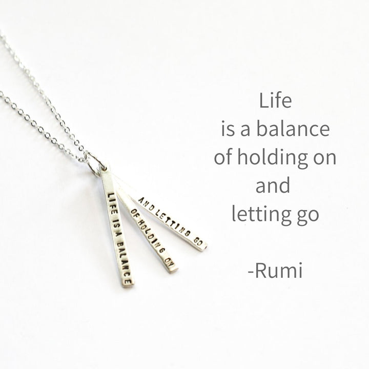 "Life is a balance of holding on and letting go" -Rumi Quote Necklace - Chocolate and Steel