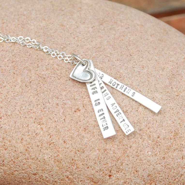 "Life is either a daring adventure or nothing" -Helen Keller Quote Necklace - Chocolate and Steel