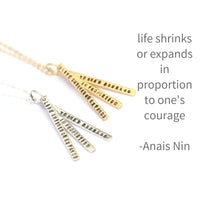 "Life Shrinks or Expands in Proportion to One's Courage" -Anais Nin Quote Necklace - Chocolate and Steel
