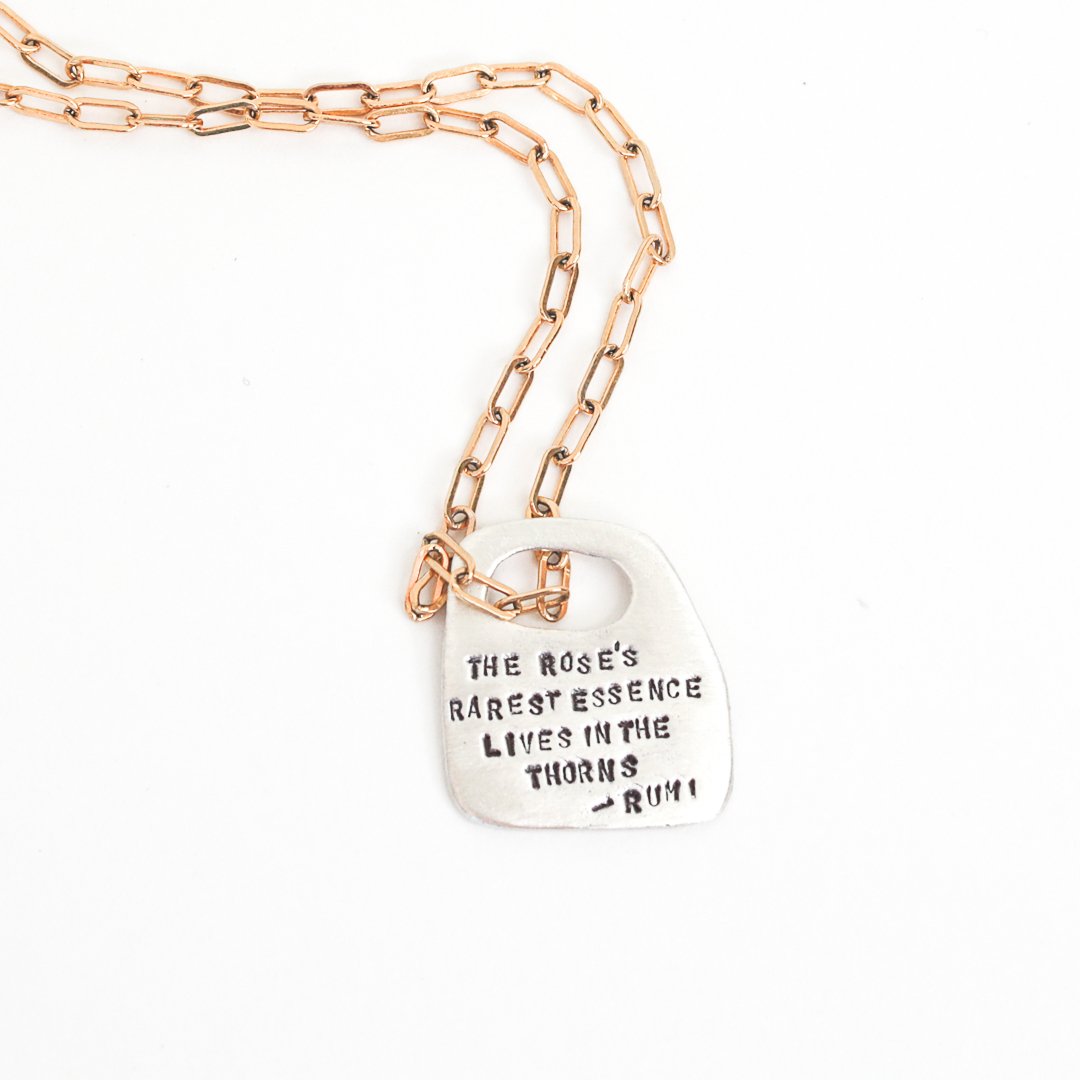 Rumi Rune Quote Necklace "The Rose's Rarest Essence Lives in the Thorns" - Chocolate and Steel