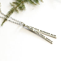 "You are absolutely unique just like everyone else." -Margaret Mead Quote Necklace - Chocolate and Steel
