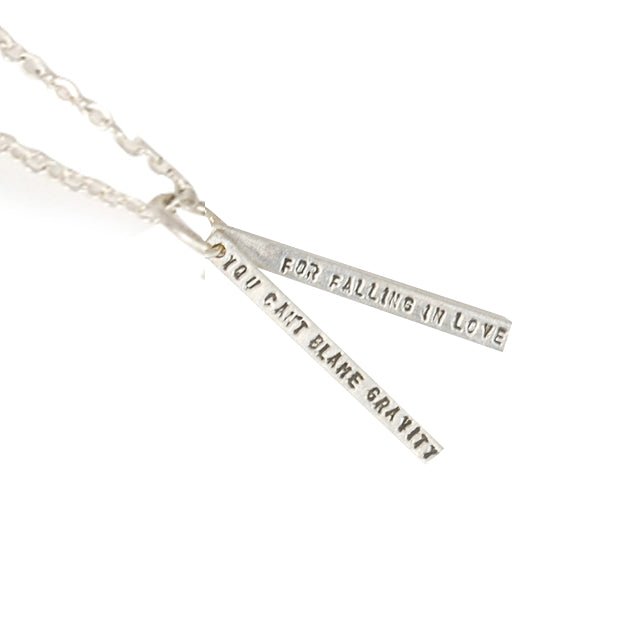"You Can't Blame Gravity for Falling in Love" - Albert Einstein quote necklace - Chocolate and Steel